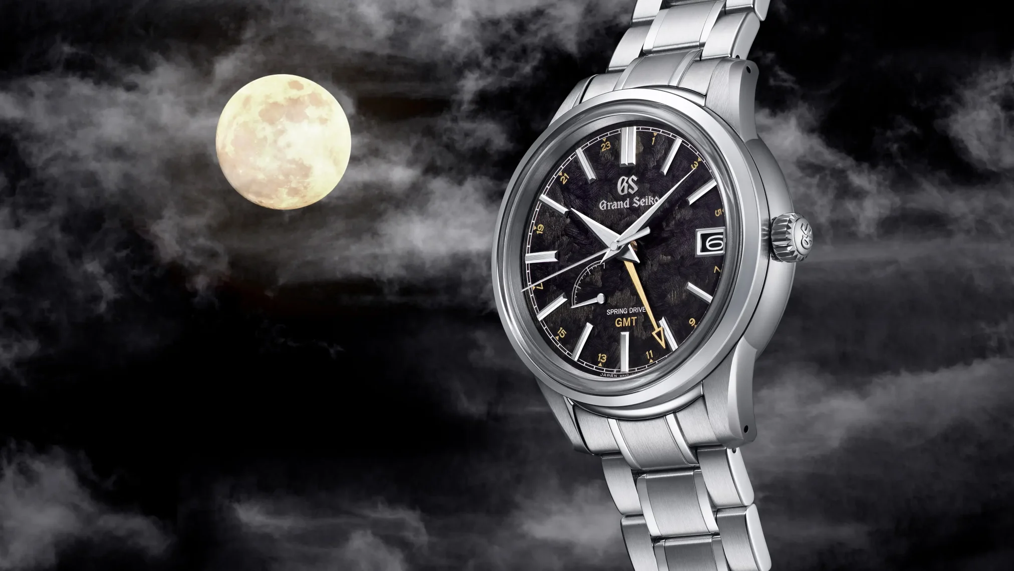 Đồng hồ Grand Seiko Elegance GMT Four Seasons Kanro SBGE271 mặt số màu đen. Dây đeo bằng thép. Thân vỏ bằng thép.