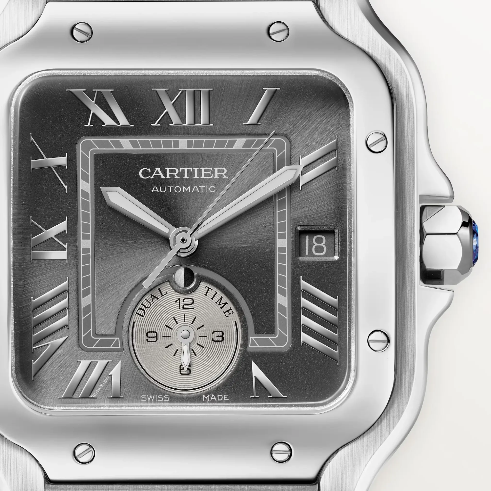 Đồng hồ Cartier Santos De Cartier Dual Time WSSA0076 với mặt số màu đen. Dây đeo bằng thép và da. Thân vỏ bằng thép.